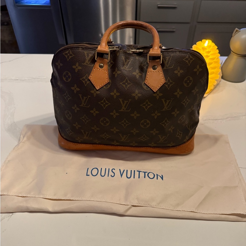 Louis Vuitton Alma  Brown Monogram purse